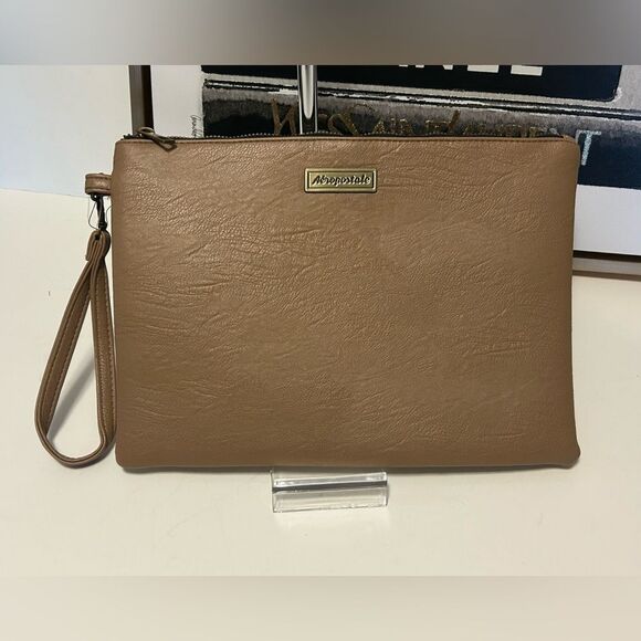 Aeropostale Handbags - Aeropostale Beige Cluth Pouch Wrislet NWT
